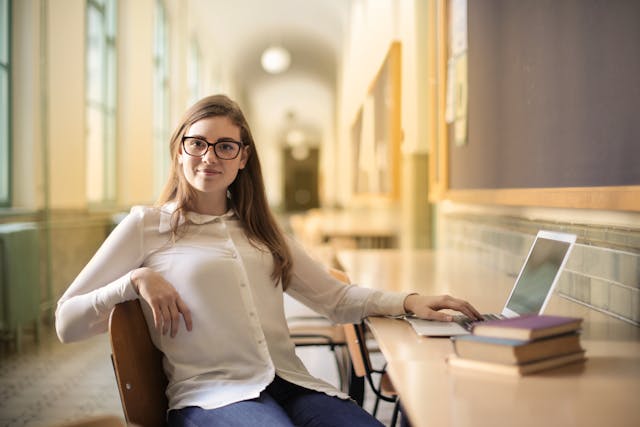 freelancer sitting on a chair facing the camera