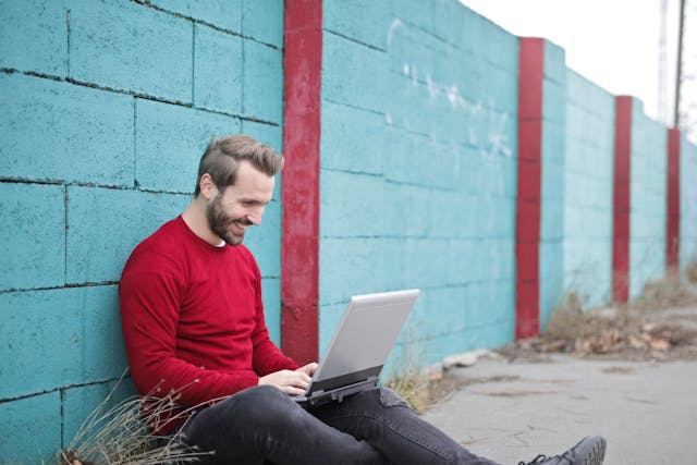 freelancer on a laptop with smile