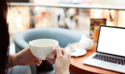 freelancer holding a cup of tea